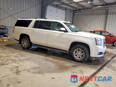 Czwarte zdjęcie samochodu z boku: 2015 GMC YUKON XL K1500 SLT VIN:1GKS2HKC1FR572373 - miniatura