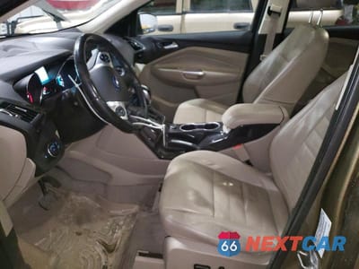 Zdjęcie 7 z 12 samochodu: 2014 FORD ESCAPE TITANIUM VIN:1FMCU9JX1EUB09256 - miniatura