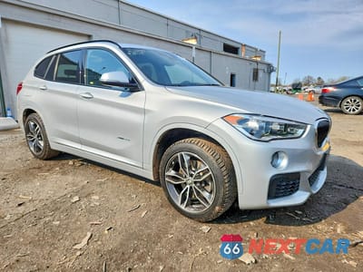 Czwarte zdjęcie samochodu z boku: 2017 BMW X1 XDRIVE28I VIN:WBXHT3C30H5F86074 - miniatura