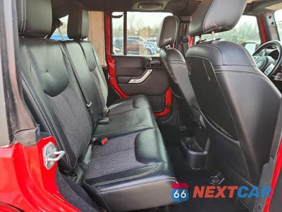 Zdjęcie 10 z 12 samochodu: 2014 JEEP WRANGLER UNLIMITED SPORT VIN:1C4BJWDG3EL182086 - miniatura