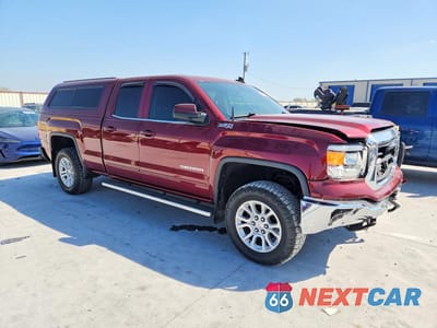 Czwarte zdjęcie samochodu z boku: 2015 GMC SIERRA K1500 SLE VIN:1GTV2UEC2FZ337073 - miniatura