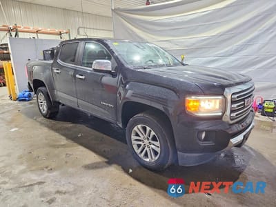 Czwarte zdjęcie samochodu z boku: 2017 GMC CANYON SLT VIN:1GTG6DEN4H1322333 - miniatura