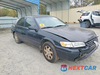 Czwarte zdjęcie samochodu z boku: 1999 TOYOTA CAMRY LE V6 VIN:JT2BF28K3X0155590 - miniatura