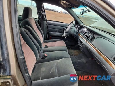 Zdjęcie 7 z 12 samochodu: 2004 FORD CROWN VICTORIA UNKNOWN VIN:2FAFP74W44X181727 - miniatura
