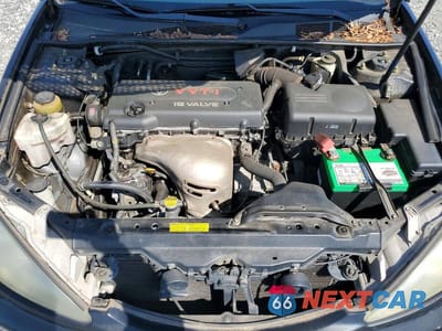 Zdjęcie 11 z 11 samochodu: 2004 TOYOTA CAMRY LE VIN:4T1BE32KX4U359117 - miniatura