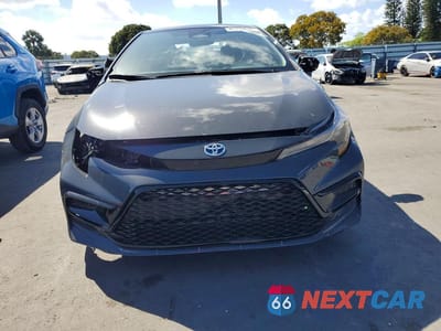 Piąte zdjęcie samochodu w środku: 2023 TOYOTA COROLLA HYBRID SE INFRARED VIN:JTDBCMFE9P3014210 - miniatura