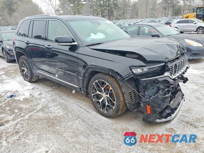 Czwarte zdjęcie samochodu z boku: 2022 JEEP GRAND CHEROKEE SUMMIT VIN:1C4RJHET1N8501087 - miniatura