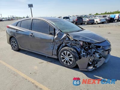 Czwarte zdjęcie samochodu z boku: 2021 TOYOTA PRIUS PRIME LE VIN:JTDKAMFP1M3178084 - miniatura