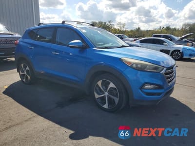 Czwarte zdjęcie samochodu z boku: 2016 HYUNDAI TUCSON LIMITED VIN:KM8J33A22GU147416 - miniatura