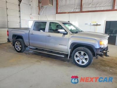 Czwarte zdjęcie samochodu z boku: 2014 GMC SIERRA K1500 SLE VIN:3GTU2UEC6EG319640 - miniatura
