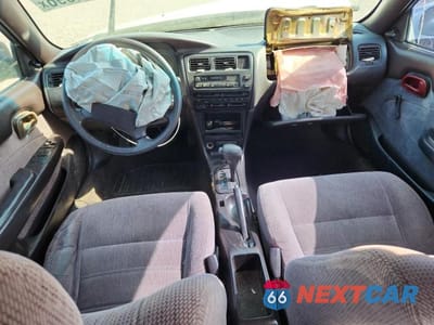 Zdjęcie 8 z 12 samochodu: 1995 TOYOTA COROLLA DX VIN:1NXAE09B7SZ316433 - miniatura