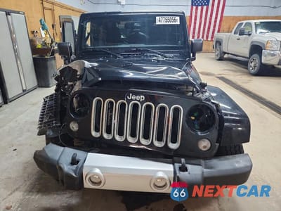 Piąte zdjęcie samochodu w środku: 2014 JEEP WRANGLER SAHARA VIN:1C4AJWBG0EL219898 - miniatura