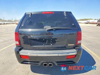 Zdjęcie 6 z 12 samochodu: 2010 JEEP GRAND CHEROKEE SRT-8 VIN:1J4RR7GW3AC105674 - miniatura