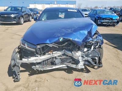 Piąte zdjęcie samochodu w środku: 2022 BMW M550XI VIN:WBA13BK0XNCJ16197 - miniatura