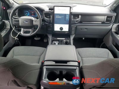 Zdjęcie 8 z 12 samochodu: 2024 FORD F150 LIGHTNING XLT VIN:1FT6W3L74RWG26910 - miniatura