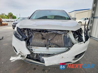Piąte zdjęcie samochodu w środku: 2020 BUICK ENCLAVE ESSENCE VIN:5GAERBKW1LJ116171 - miniatura