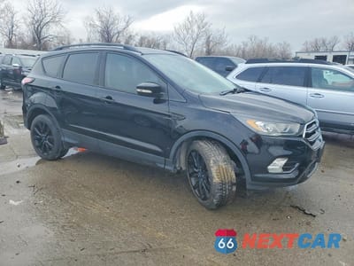 Czwarte zdjęcie samochodu z boku: 2017 FORD ESCAPE TITANIUM VIN:1FMCU0JD3HUA80896 - miniatura