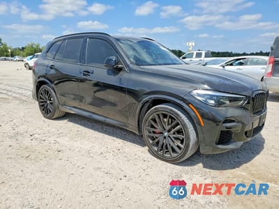 Czwarte zdjęcie samochodu z boku: 2022 BMW X5 SDRIVE 40I VIN:5UXCR4C03N9J95924 - miniatura
