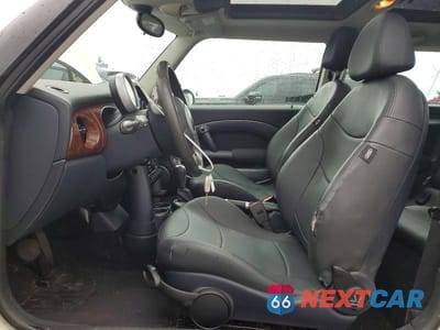 Zdjęcie 7 z 11 samochodu: 2003 MINI COOPER VIN:WMWRC33413TE18200 - miniatura