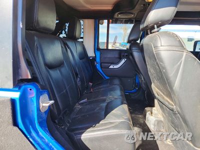 Zdjęcie 11 z 13 samochodu: 2014 JEEP WRANGLER UNLIMITED SAHARA VIN:1C4BJWEG0EL168998 - miniatura