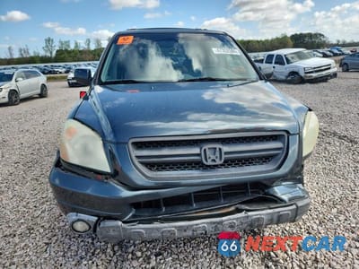 Piąte zdjęcie samochodu w środku: 2005 HONDA PILOT EXL VIN:5FNYF18655B048408 - miniatura