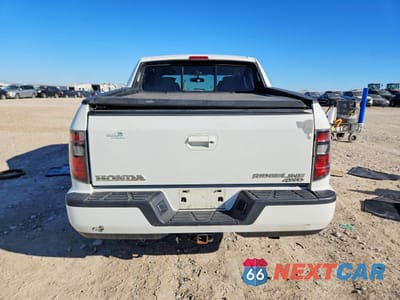 Zdjęcie 6 z 13 samochodu: 2014 HONDA RIDGELINE SPORT VIN:5FPYK1F78EB010217 - miniatura