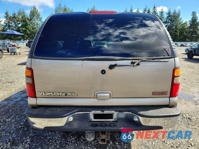 Zdjęcie 6 z 13 samochodu: 2001 GMC YUKON XL VIN:3GKFK16TX1G149125 - miniatura