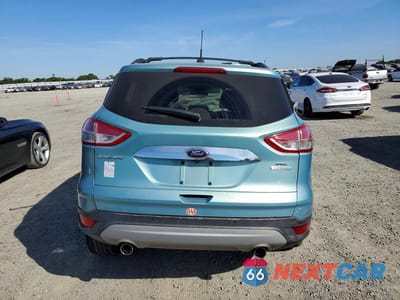 Zdjęcie 6 z 12 samochodu: 2013 FORD ESCAPE SEL VIN:1FMCU0H9XDUC16016 - miniatura
