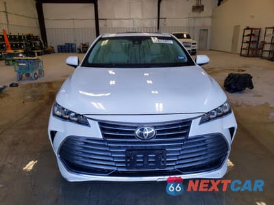 Piąte zdjęcie samochodu w środku: 2021 TOYOTA AVALON XLE VIN:4T1AZ1FB0MU059536 - miniatura