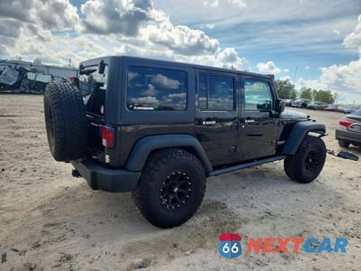 Trzecie zdjęcie samochodu z tyłu: 2011 JEEP WRANGLER UNLIMITED RUBICON VIN:1J4HA6H13BL585863 - miniatura