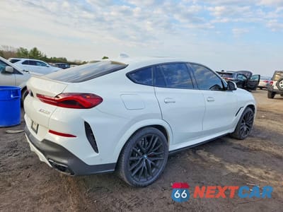 Trzecie zdjęcie samochodu z tyłu: 2021 BMW X6 M50I VIN:5UXCY8C01M9E79306 - miniatura