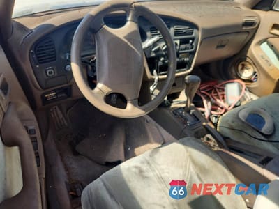 Zdjęcie 8 z 13 samochodu: 1993 TOYOTA CAMRY LE VIN:4T1SK12E2PU195678 - miniatura