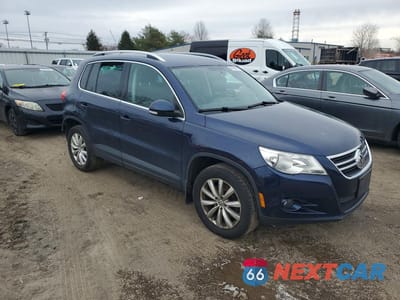 Czwarte zdjęcie samochodu z boku: 2011 VOLKSWAGEN TIGUAN S VIN:WVGBV7AX3BW553820 - miniatura