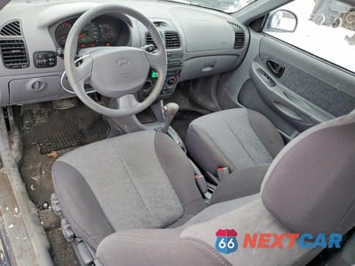 Zdjęcie 8 z 11 samochodu: 2006 HYUNDAI ACCENT GT VIN:KMHCG35C86U364676 - miniatura