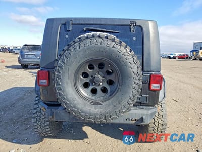 Zdjęcie 6 z 12 samochodu: 2010 JEEP WRANGLER SPORT VIN:1J4AA2D11AL203487 - miniatura