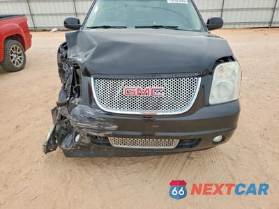Zdjęcie 12 z 13 samochodu: 2011 GMC YUKON XL DENALI VIN:1GKS2MEF6BR398986 - miniatura
