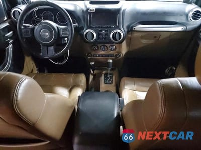 Zdjęcie 8 z 13 samochodu: 2012 JEEP WRANGLER UNLIMITED SAHARA VIN:1C4BJWEG6CL191585 - miniatura