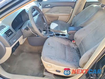 Zdjęcie 7 z 12 samochodu: 2010 FORD FUSION SE VIN:3FAHP0HA1AR340986 - miniatura