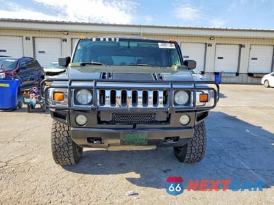 Piąte zdjęcie samochodu w środku: 2003 HUMMER H2 VIN:5GRGN23U43H107700 - miniatura