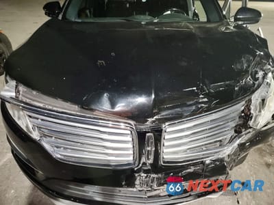 Zdjęcie 12 z 14 samochodu: 2017 LINCOLN MKC RESERVE VIN:5LMCJ3C92HUL31780 - miniatura