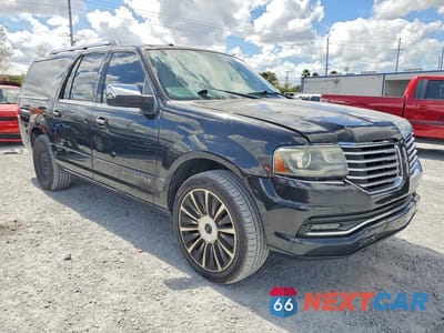 Czwarte zdjęcie samochodu z boku: 2015 LINCOLN NAVIGATOR L VIN:5LMJJ3JT7FEJ08616 - miniatura