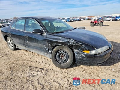 Czwarte zdjęcie samochodu z boku: 1999 OLDSMOBILE INTRIGUE GLS VIN:1G3WX52H0XF387470 - miniatura