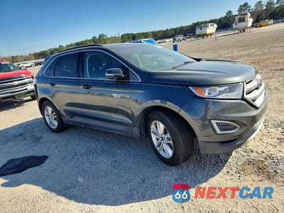 Czwarte zdjęcie samochodu z boku: 2015 FORD EDGE SEL VIN:2FMTK3J97FBB08124 - miniatura