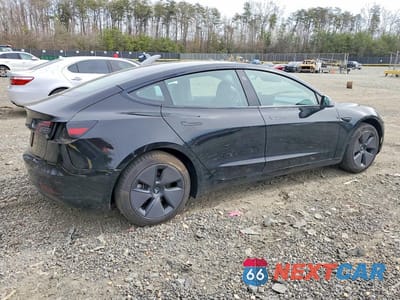 Trzecie zdjęcie samochodu z tyłu: 2023 TESLA MODEL 3 VIN:5YJ3E1EA4PF679157 - miniatura