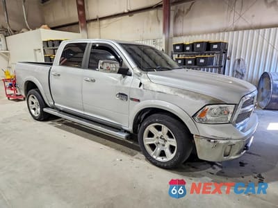 Czwarte zdjęcie samochodu z boku: 2015 RAM 1500 LONGHORN VIN:1C6RR6PMXFS623400 - miniatura