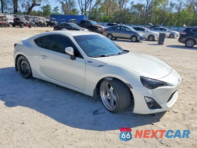 Czwarte zdjęcie samochodu z boku: 2015 SCION FR-S BASE VIN:JF1ZNAA11F9702103 - miniatura