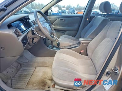 Zdjęcie 7 z 11 samochodu: 2000 TOYOTA CAMRY LE VIN:JT2BG22K3Y0523872 - miniatura