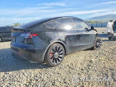 Trzecie zdjęcie samochodu z tyłu: 2023 TESLA MODEL Y VIN:7SAYGDEF4PF874675 - miniatura