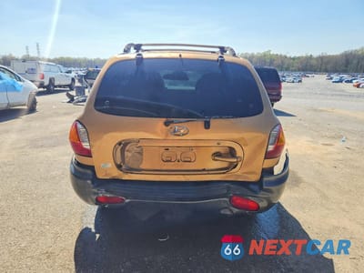 Zdjęcie 6 z 13 samochodu: 2004 HYUNDAI SANTA FE GLS VIN:KM8SC13D04U593034 - miniatura