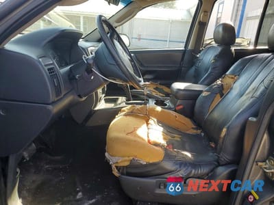 Zdjęcie 7 z 13 samochodu: 2003 JEEP GRAND CHEROKEE LAREDO VIN:1J8GX48S83C598146 - miniatura